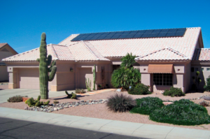 Phoenix residential home with rooftop solar panels showing solar-ready roofing and clean roof planning