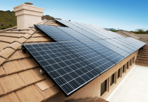 Rooftop solar panels on a tile roof showing the importance of flashing and watertight roof penetrations