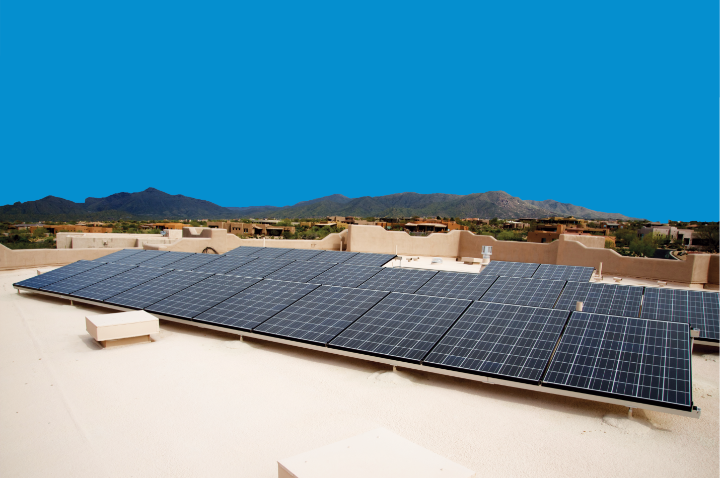 Solar panels mounted with flashed penetrations on an Arizona roof
