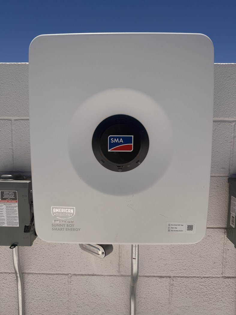 Solar inverter equipment on a rooftop during solar service diagnostics in Phoenix, AZ