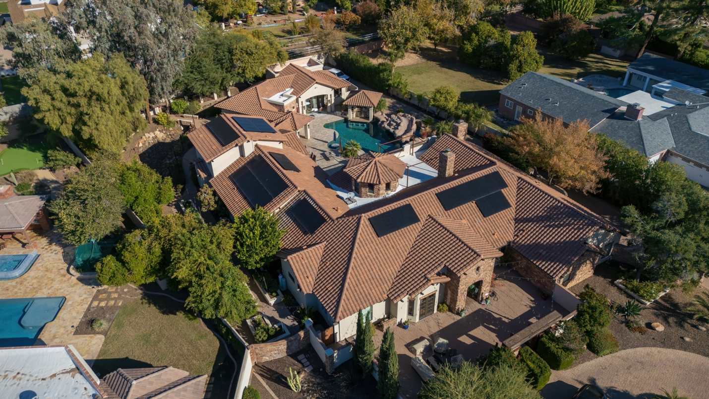 Solar Attic Fans: The Overlooked Roof Upgrade for Phoenix Homes a roofing system with solar panels.