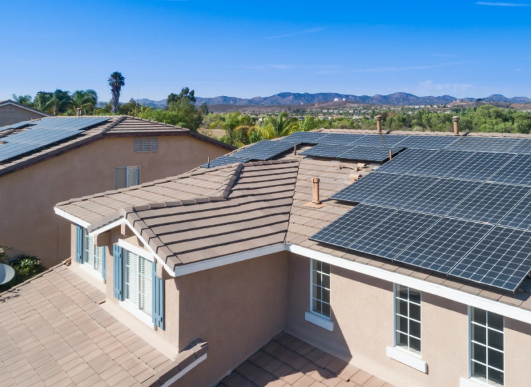 Aerial view of a Maricopa County neighborhood with solar-equipped homes