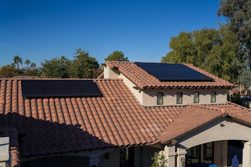 Why Every Phoenix Home Needs a Custom Design From Residential Solar Installers in Phoenix, AZ Rooftop solar panels on a tile roof showing a custom layout by residential solar installers in Phoenix, AZ