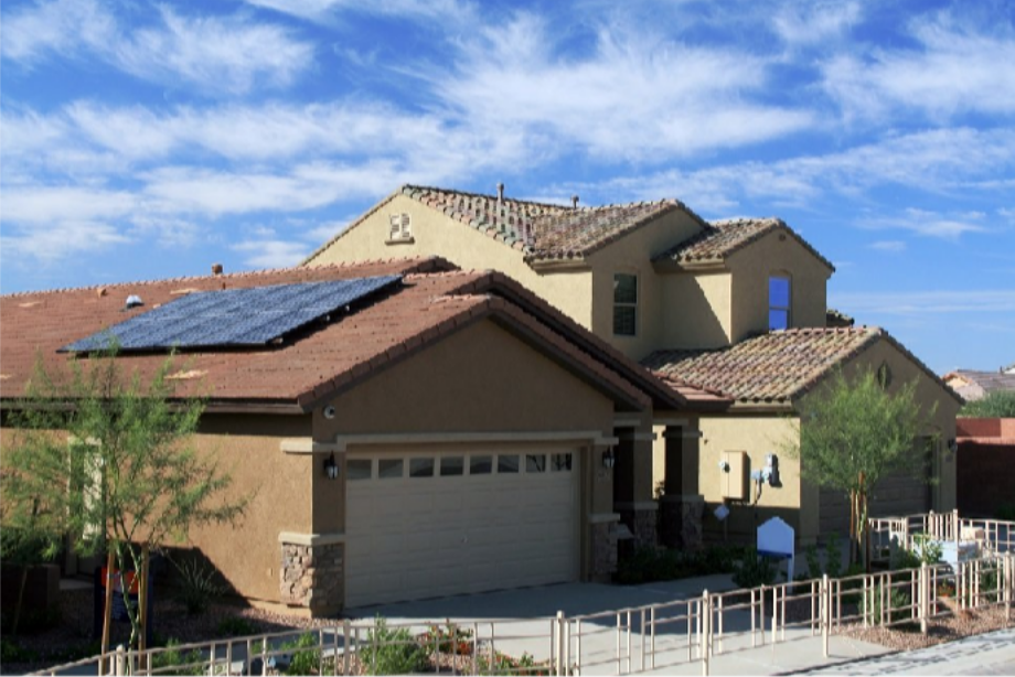 Solar for New Construction: Planning a Home Solar Installation in Phoenix, Arizona Before the Roof Goes On Two-story Arizona home with solar panels integrated into its roof design