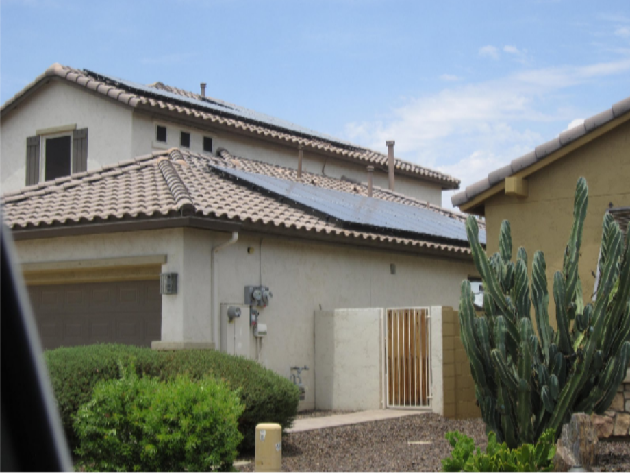 Why Peoria Homeowners Should Review Roof Age Before a Roof Replacement With Solar in Peoria, AZ Two-story Arizona home with a tile roof and rooftop solar panels