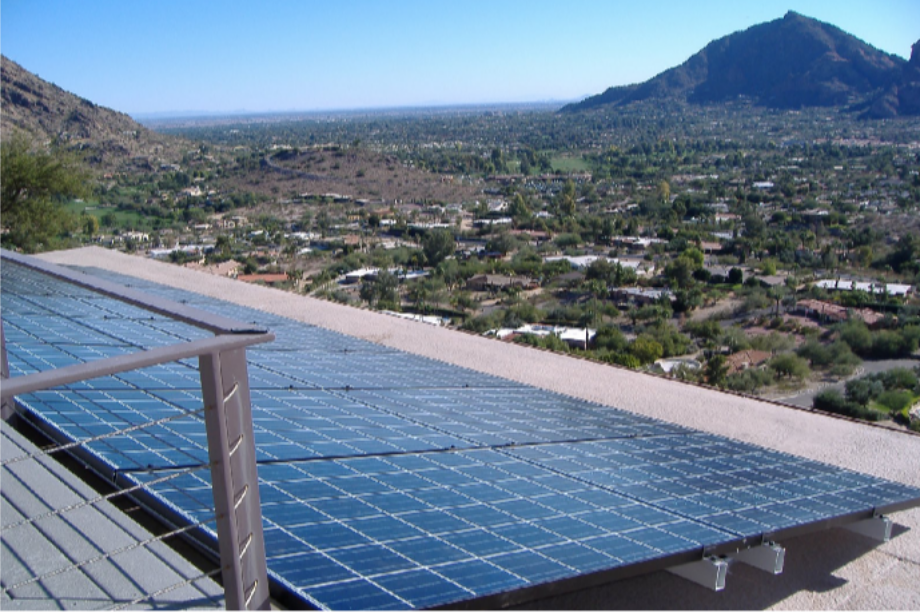 Solar panels on an Arizona roof overlooking desert mountains, reflecting view-conscious solar planning for Fountain Hills homes