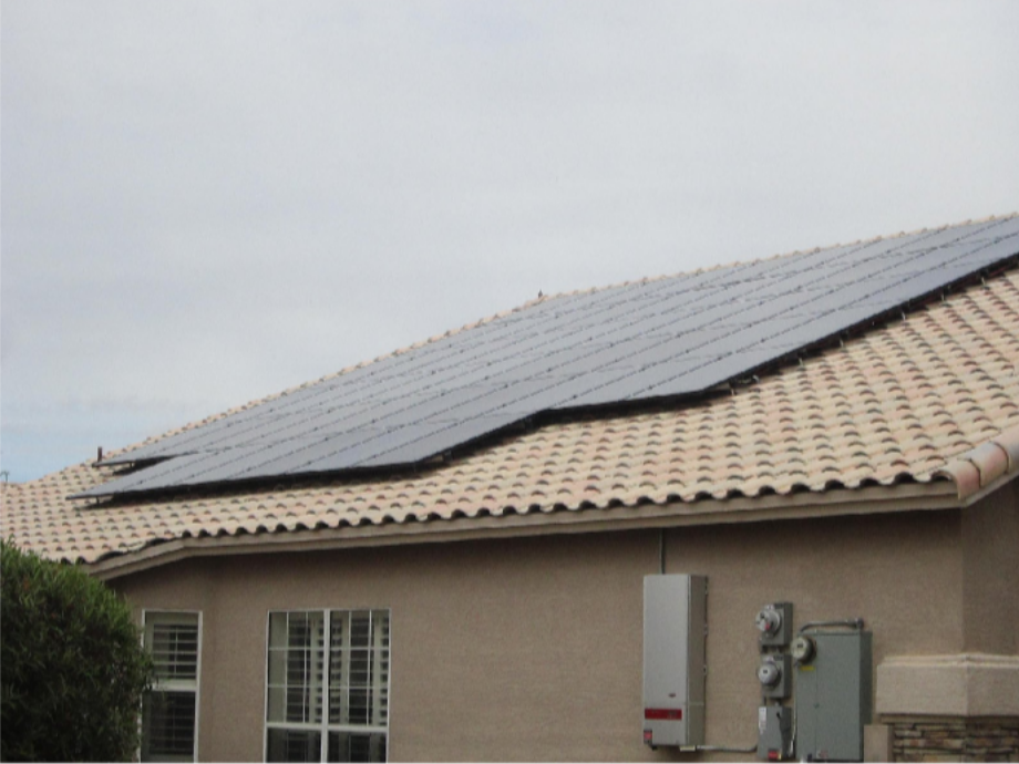 Solar for New Construction: Planning a Home Solar Installation in Phoenix, Arizona Before the Roof Goes On Residential solar panels on a tile roof beside exterior electrical equipment