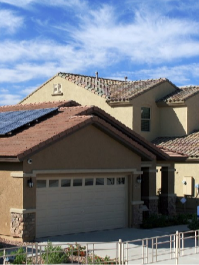 Solar for New Construction: Planning a Home Solar Installation in Phoenix, Arizona Before the Roof Goes On Residential Arizona home with rooftop solar integrated into the roof design