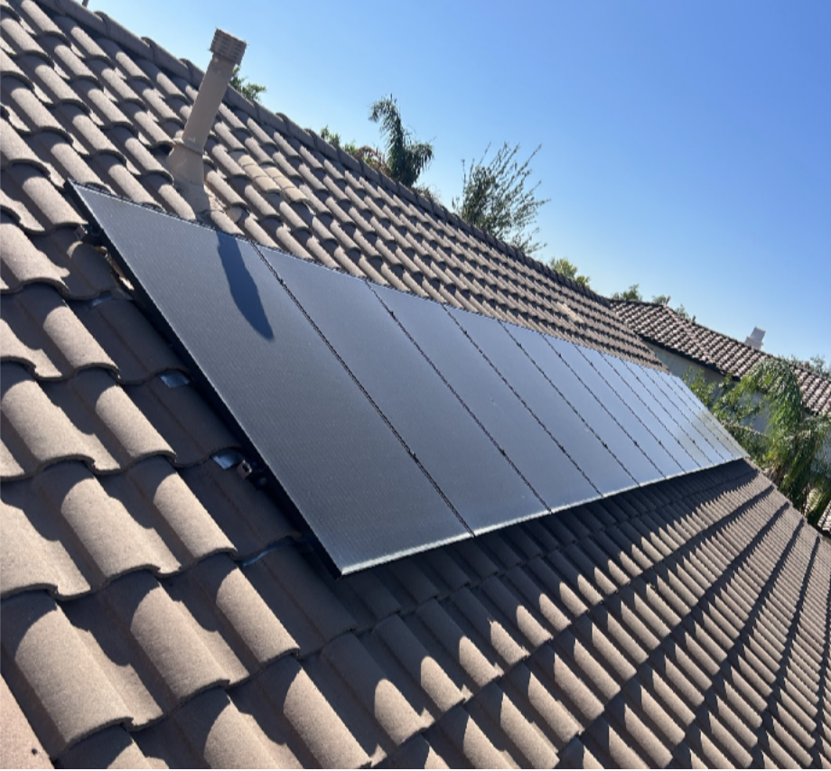 How Monsoon Prep Changes With a Solar Roof Installation in Phoenix, AZ Solar panels mounted on a tile roof in Phoenix as part of monsoon-readiness planning
