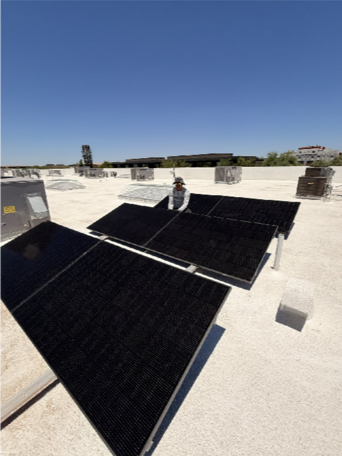 Commercial Roofing and Solar: How the Right Commercial Roofing and Solar Company in Phoenix, AZ Plans Around Business Continuity Solar panels on a flat commercial roof with clear work areas around the array