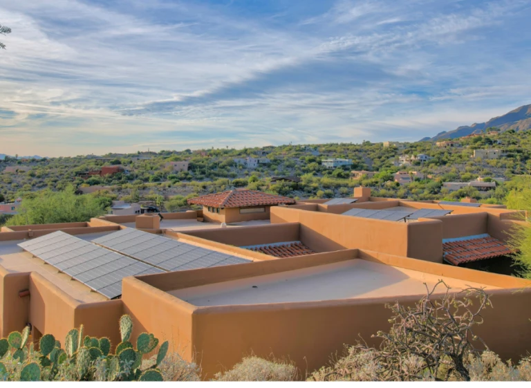Luxury Arizona home with integrated rooftop solar system demonstrating high-performance residential roofing design