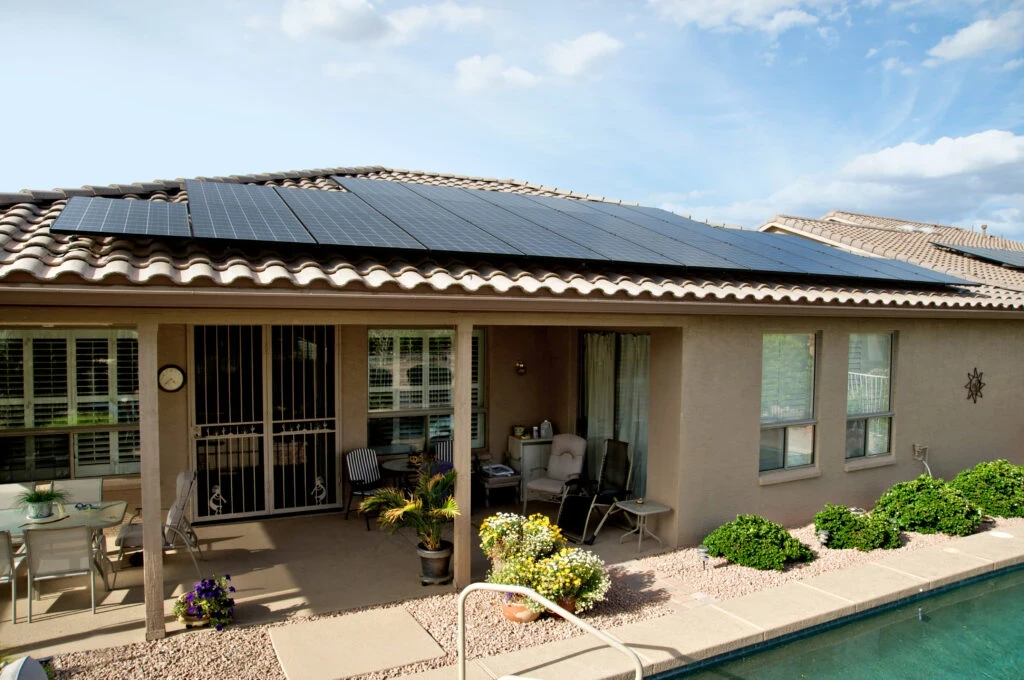Residential solar panels installed on a tile roof in Phoenix during a professional solar panel installation process